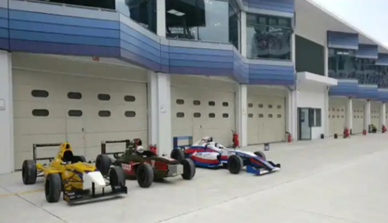 Large Industrial Workshop Seccional Porta Aérea Plano ou Contoured Panel Design 50mm-80mm espessura isolado Seccional Garage Door