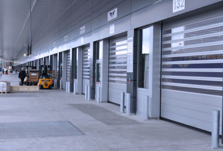 Liga de alumínio Potência do motor da porta espiral de alta velocidade 0,75KW Eficiência de segurança ≤ 2,0m3/ M2.s Velocidade de fechamento 0,8m/s