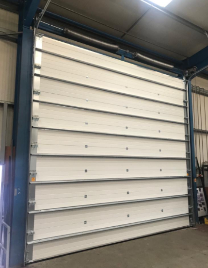 Exportadores de Portas Seccionais Industriais de Alta Segurança para Bombeiros com Fechadura, Formadas Automaticamente e Cortina de Rolo à Prova de Fogo com Liberação de Emergência